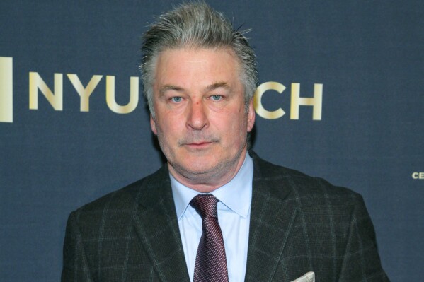 FILE - Alec Baldwin attends the NYU Tisch School of the Arts 50th Anniversary Gala at Jazz at Lincoln Center's Frederick P. Rose Hall, April 4, 2016, in New York. A New Mexico judge has set a trial date for Baldwin on an involuntary manslaughter charge stemming from a deadly shooting on the set of the Western 鈥淩ust.鈥� Jury selection is scheduled to begin July 9, with the trial starting the following day. The proceedings are expected to last eight days. Baldwin, the lead actor and a co-producer on the film, pleaded not guilty in January. (Photo by Andy Kropa/Invision/AP, File)