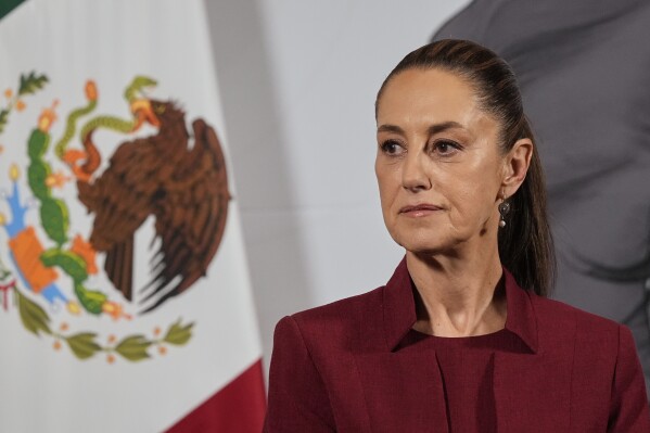 Mexican President Claudia Sheinbaum attends her morning press conference at the National Palace in Mexico City, April 2, 2025. (AP Photo/Marco Ugarte, File)
