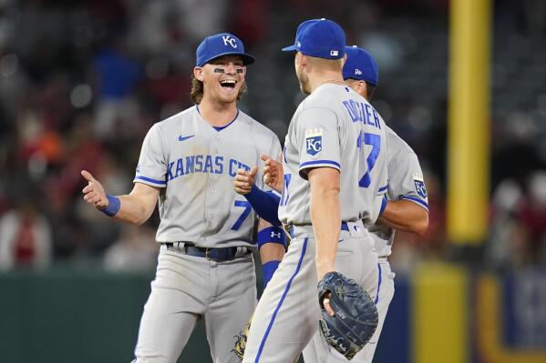 Kansas City Royals' Whit Merrifield (15) celebrates with bench