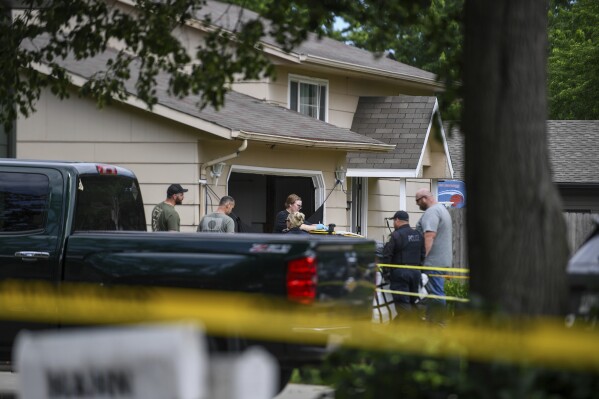 Sioux Falls police investigate after a deadly shooting on Saturday, June 8, 2024, in Sioux Falls, S.D. A shooting in a Sioux Falls neighborhood left multiple people dead and several others injured early Saturday, police said. (Samantha Laurey/The Argus Leader via AP)