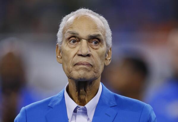 FILE - In this Oct. 28, 2018, file  photo, Former Detroit Lions player Roger Brown watches during the team's NFL football game against the Seattle Seahawks in Detroit. Brown, a College Football Hall of Famer and six-time Pro Bowl selection with the Lions and the Los Angeles Rams, has died. He was 84. The Lions and College Football Hall of Fame announced his death Friday, Sept. 17, 2021. The Lions said a member of Brown's family confirmed the death. No cause was given. (AP Photo/Paul Sancya, File)
