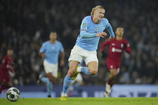 Manchester City's Erling Haaland in action during the English League Cup soccer match between Manchester City and Liverpool at Etihad stadium in Manchester, England, Thursday, Dec. 22, 2022. (AP Photo/Jon Super)