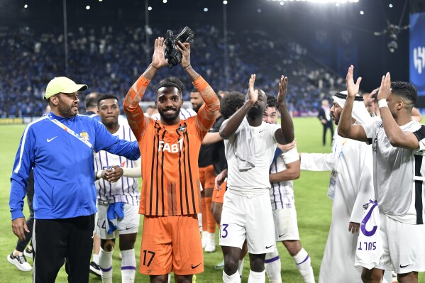 UAE's Al Ain' players celebrate after the second leg of their AFC Champions League 2023/24 semi-final match against Saudi Arabia's Al Hilal at Kingdom Arena Stadium in Riyadh, Saudi Arabia, Tuesday, April 23, 2024. (AP Photo)