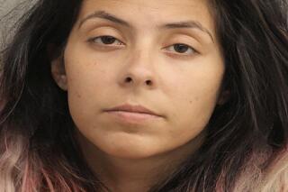 This undated photo provided by the Houston Police Department shows Theresa Raye Balboa. Houston police have charged Balboa with evidence tampering in the death of Samuel Olson. Balboa was the girlfriend of Samuel's father. (Houston Police Department via AP)