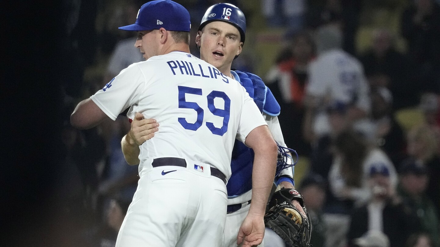 Los Angeles Dodgers catcher Will Smith (16) leaves the pitcher's