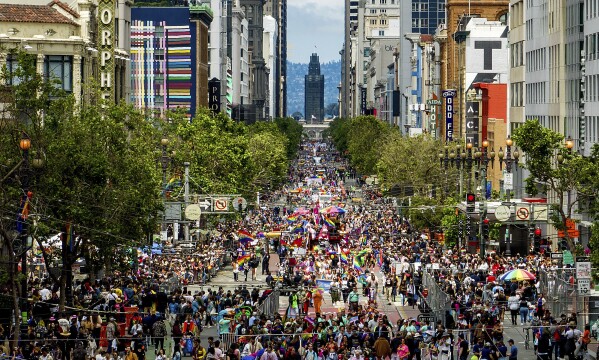 Revelers fill Market St. while marching in San Francisco's Pride Parade on Sunday, June 25, 2023. (AP Photo/Noah Berger)