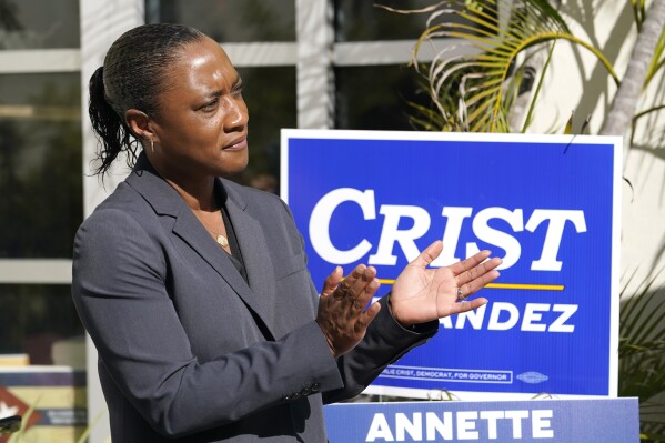 FILE - Laphonza Butler, president of EMILY's List, listens during a rally held by the Latino Victory Fund, Oct. 20, 2022, in Coral Gables, Fla. A spokesman in California Gov. Gavin Newsom's office said on Sunday, Oct. 1, 2023, that he will name Butler to the Senate seat of the late Dianne Feinstein. (AP Photo/Lynne Sladky, File)