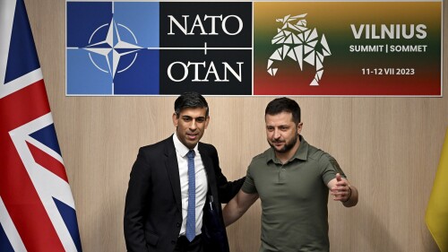 Britain's Prime Minister Rishi Sunak, left, and Ukraine's President Volodymyr Zelenskyy, right, pose for a photo during a bilateral meeting on the sidelines of the NATO Summit in Vilnius, Lithuania, Wednesday, July 12, 2023. (Paul Ellis/Pool Photo via AP)