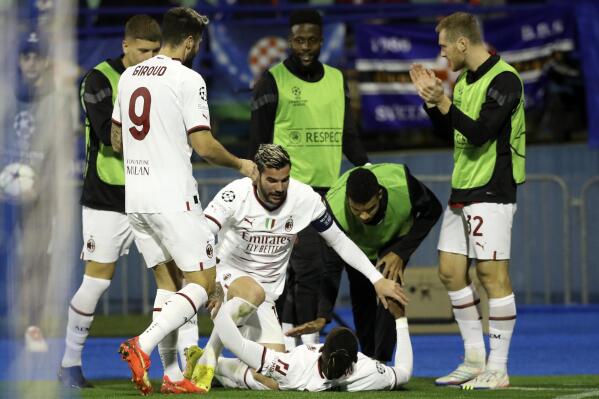 AC Milan's Rafael Leao celebrates with teammates after scoring his side's second goal during the Champions League Group E soccer match between Dinamo Zagreb and AC Milan in Zagreb, Croatia, Tuesday, Oct. 25, 2022. (AP Photo)