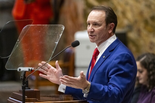 FILE - Louisiana Gov. Jeff Landry speaks during the start of the special session in the House Chamber, Jan. 15, 2024, in Baton Rouge, La. Civil rights attorneys say a new Louisiana law that makes it a crime to approach within 25 feet of a police officer under certain circumstances is an affront to the movement for racial justice and violates the First Amendment. Critics have said the law signed this week by Republican Gov. Jeff Landry could hinder the public’s ability to film officers. (Michael Johnson/The Advocate via AP, Pool, File)
