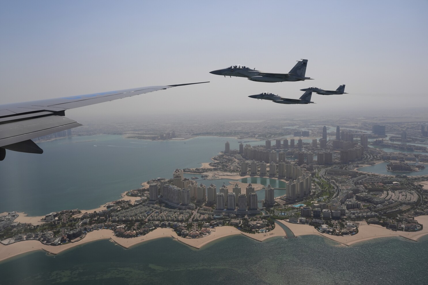 Trump gets another fighter jet escort as he visits Qatar on Mideast trip