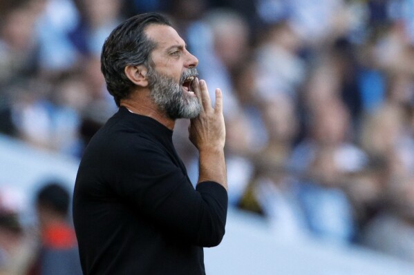 FILE - The then Watford's head coach Quique Sanchez Flores shouts during the English Premier League soccer match between Manchester City and Watford at Etihad stadium in Manchester, England, Saturday Sept. 21, 2019. Sevilla says the Spanish club and coach Quique Sánchez Flores have agreed to part ways at the end of the season and annul the final year of his contract. (AP Photo/Rui Vieira, File)