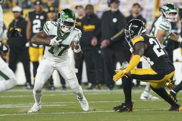Jets meet Patriots in battle to get out of AFC East cellar | AP News