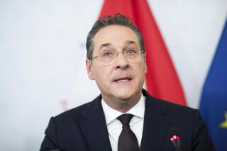 FILE - In this Saturday, May 18, 2019 file photo then Austrian Vice Chancellor Heinz-Christian Strache (Austrian Freedom Party) addresses the media during press conference at the sport ministry in Vienna, Austria. Austria's far-right Freedom Party on Friday expelled Heinz-Christian Strache, its longtime leader and the country's former vice chancellor - months after a scandal that ended the party's time in government. (AP Photo/Michael Gruber, file)