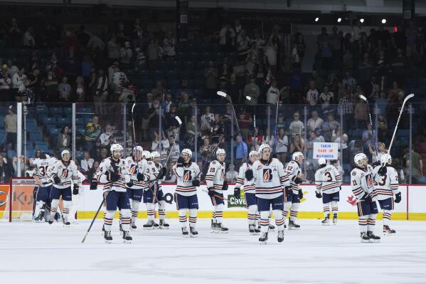 Kamloops Blazers players salute the crowd after defeating the Peterborough Petes during CHL Memorial Cup hockey game action in Kamloops, British Columbia, Sunday, May 28, 2023. (Darryl Dyck/The Canadian Press via AP)