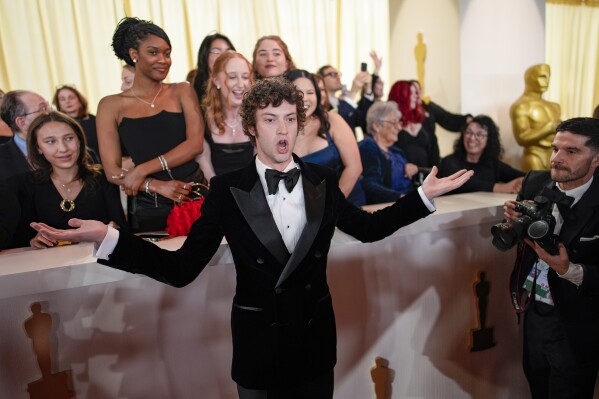 Dominic Sessa arrives at the Oscars on Sunday, March 10, 2024, at the Dolby Theatre in Los Angeles. (AP Photo/John Locher)