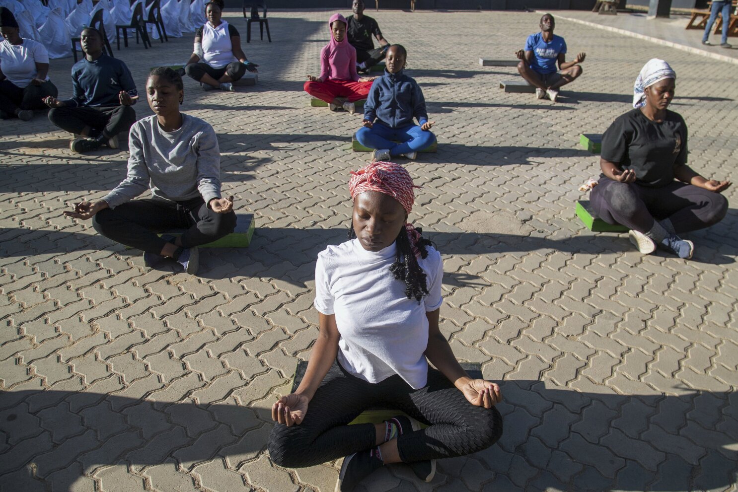 Yoga in a Zimbabwe bar is the latest mental health outreach in a struggling country