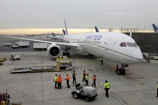 FILE - A Dreamliner 787-10 arriving from Los Angeles pulls up to a gate at Newark Liberty International Airport in Newark, N.J., Monday, Jan. 7, 2019. Federal safety officials are directing operators of some Boeing planes to adopt extra procedures when landing on wet or snowy runways near impending 5G service because, they say, interference from the wireless networks could mean that the planes need more room to land.
The Federal Aviation Administration said Friday, Jan. 14, 2022, that interference could delay systems like thrust reversers on Boeing 787s from kicking in, leaving only the brakes to slow the plane. (AP Photo/Seth Wenig, File)