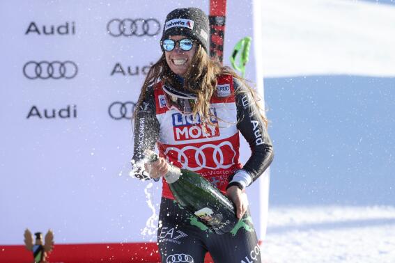 Italy's Marta Bassino celebrates winning an alpine ski, women's World Cup giant slalom, in Sestriere, Italy, Saturday, Dec.10, 2022. (AP Photo/Alessandro Trovati)