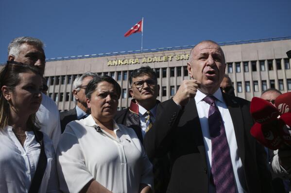 Umit Ozdag, the leader of nationalist Victory Party, speaks to the media after he filed a legal complaint, in Ankara, Turkey, Monday, Aug. 29, 2022, demanding that prosecutors investigate allegations of corruption. A fugitive mafia boss-turned-whistleblower has accused a group of people, including a presidential advisor and a ruling party legislator, of demanding bribes from a businesswoman. (AP Photo/Burhan Ozbilici)