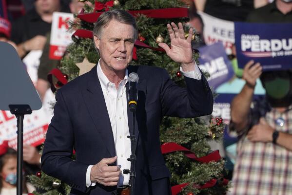FILE – David Perdue, then a U.S. senator, speaks in Augusta, Ga. on Dec. 10, 2020. Perdue, a Georgia gubernatorial candidate, said on Thursday, Jan. 20, 2022, that he wants to create a separate election fraud investigation unit as part of the Georgia Bureau of Investigation. (AP Photo/John Bazemore, File)