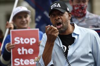 FILE-In thos Saturday, Nov. 7, 2020 file photo, Georgia State Rep. Vernon Jones speaks at a political rally, in Atlanta. (AP Photo/Mike Stewart, File)