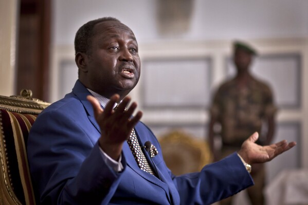 FILE- President of the Central African Republic Francois Bozize speaks to the media at the presidential palace in Bangui, Central African Republic, Jan. 8, 2013. An internationally backed court in the Central African Republic issued an international arrest warrant Tuesday, April 30, 2024, for the country’s exiled former Bozize for human rights abuses from 2009 to 2013, a spokesperson said. (AP Photo/Ben Curtis, File)