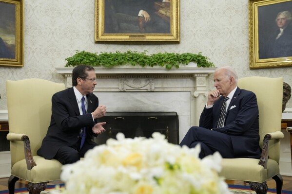 President Joe Biden meets with Israel's President Isaac Herzog in the Oval Office of the White House in Washington, Tuesday, July 18, 2023. (AP Photo/Susan Walsh)