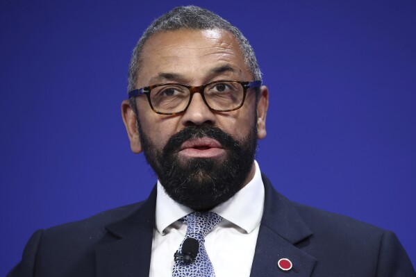 FILE - Britain's Foreign Secretary James Cleverly addresses the closing session on the second day of the Ukraine Recovery Conference in London, on June 22, 2023. Cleverly is set to visit China on Wednesday, Aug. 30, 2023 in the first trip by a U.K. foreign secretary to the country in more than five years. (Henry Nicholls/Pool Photo via AP)