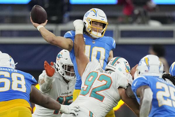 Herbert, short-handed defense lead Chargers past Fins 23-17