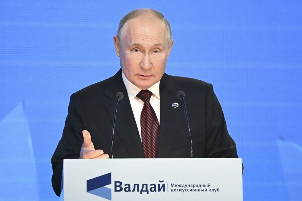 Russian President Vladimir Putin addresses the annual meeting of the Valdai Discussion Club in the Black Sea resort of Sochi, Russia, Thursday, Oct. 5, 2023. (Sergei Guneyev/Sputnik, Kremlin Pool Photo via AP)