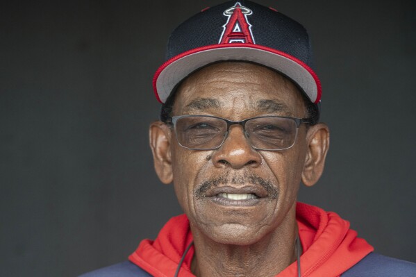 Los Angeles Angels manager Ron Washington looks on before a baseball game against the Cleveland Guardians, Friday, May 30, 2025, in Cleveland. (AP Photo/Phil Long)