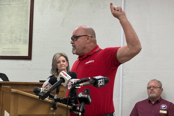 A Hanceville resident gives an emotional testimony about whether the local police department should be disbanded, in Hanceville, Ala., Feb. 27, 2025. (AP Photo/Safiyah Riddle, File)