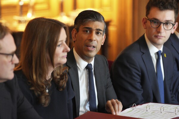 Britain's Prime Minister Rishi Sunak, center, and Education Secretary Gillian Keegan, center left, hold a meeting with universities leaders and representatives from the Union of Jewish Students in Downing Street, London, England, Thursday May 9, 2024. Pro-Palestinian protesters have begun building encampments at universities around the U.K. over the past two weeks as students and academics call on the institutions to cut ties with Israel over its offensive in the Gaza Strip. (Carl Court/Pool via AP)