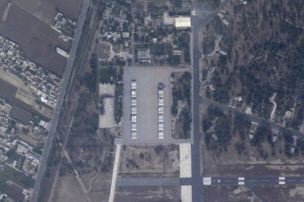 This satellite image from Planet Labs PBC shows damage, center right, after a militant attack targeted the Mianwali Training Air Base in Pakistan, Saturday, Nov. 4, 2023. Satellite photos analyzed Monday, Nov. 6, 2023, by The Associated Press showed damage at the air base following an attack by nine militants, whom the Pakistani military described as killing during their assault. (Planet Labs LBC via AP)