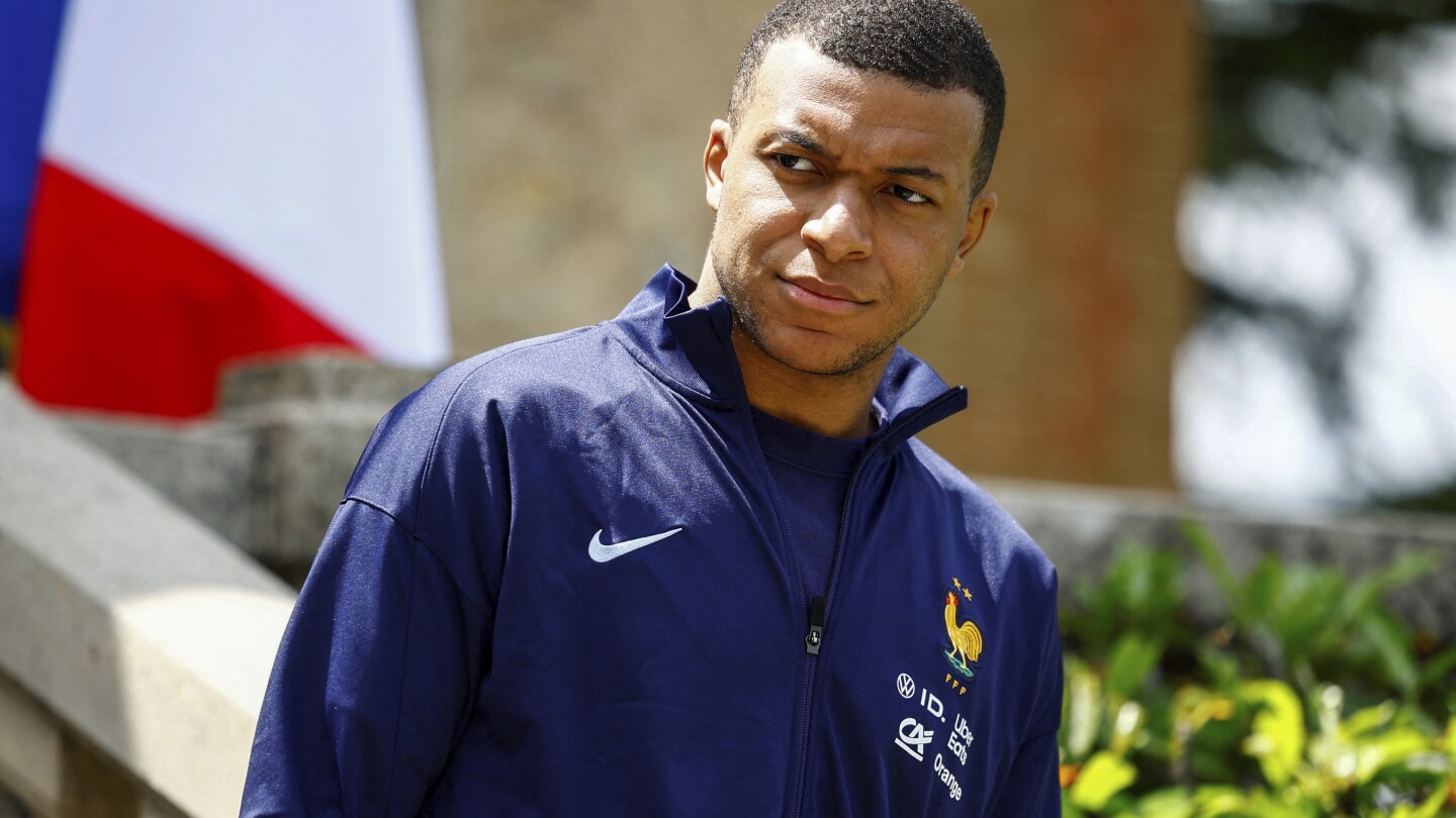Mbappé declares his 'immense pleasure' at joining Real Madrid after unhappy end to PSG career | AP News