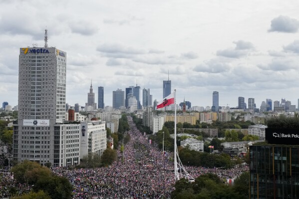 Thousands of people gather for a march to support the opposition against the governing populist Law and Justice party in Warsaw, Poland, Sunday, Oct. 1, 2023. Polish opposition leader Donald Tusk seeks to boost his election chances for the parliament elections on Oct. 15, 2023, leading the rally in the Polish capital. (AP Photo/Czarek Sokolowski)