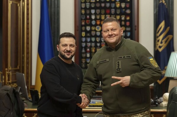 FILE - In this photo provided by the Ukrainian Presidential Press Office, Ukrainian President Volodymyr Zelenskyy, left, shakes hands with Commander-in-Chief of Ukraine's Armed Forces Valerii Zaluzhnyi during their meeting in Kyiv, Ukraine, Thursday, Feb. 8, 2024. Zelenskyy's decision to dismiss Zaluzhnyi disappointed many Ukrainians and worried its Western allies. (Ukrainian Presidential Press Office via AP, File)