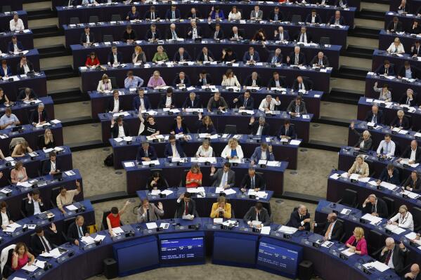 European lawmakers vote on climate change issues at the European Parliament in Strasbourg, eastern France, Tuesday, Sept. 13, 2022. European Union lawmakers have backed a proposal for a law that would ban the sale in the 27-nation bloc of agriculture products linked to the destruction of forests. (AP Photo/Jean-Francois Badias)