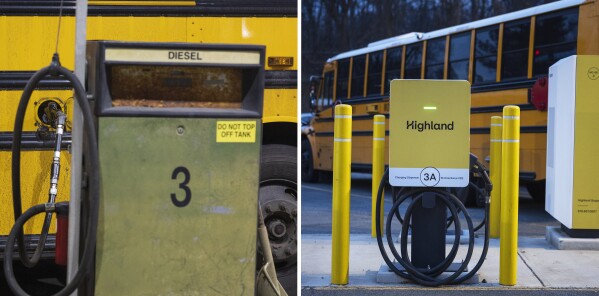A bus lot has a diesel pump on the left and an electric charger station on the right.  (AP Photo/Tom Brenner)