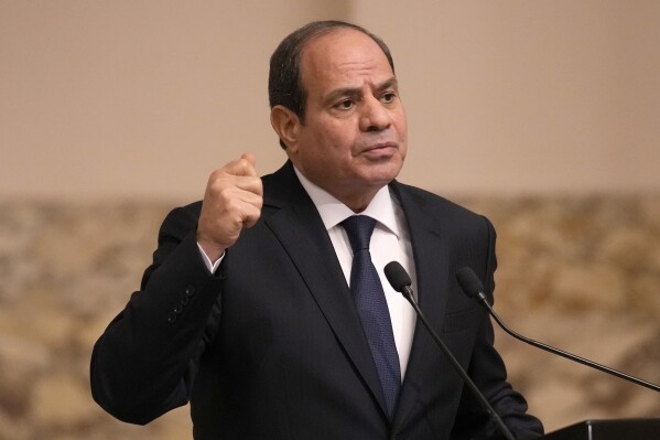 FILE - Egyptian President Abdel Fattah el-Sissi gestures during a joint press conference with French President Emmanuel Macron in Cairo, Egypt, on Oct. 25, 2023. President Abdel-Fattah el-Sissi of Egypt was sworn in for a third six-year term on Tuesday April 2, 2024 after being re-elected in a December vote in which he faced no serious challengers. (AP Photo/Christophe Ena, Pool, File)