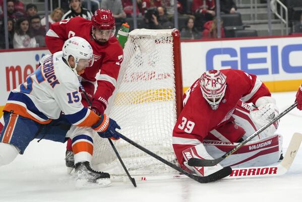 Detroit Red Wings goaltender Alex Nedeljkovic (39) stops a shot as