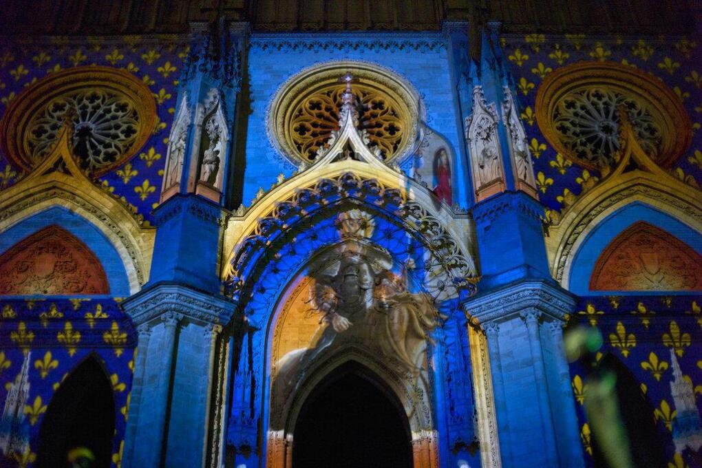 An artistic projection showing Joan of Arc is seen at Orlean's cathedral during ceremonies marking the 600th anniversary of the birth of Joan of Arc, in Orleans, central France, Sunday April 29, 2012. The city of Orleans goes all out with celebrations marking the 600th birthday of Joan of Arc, a national icon and symbol of French resistance through the ages at a time when French identity and France's role in the world are a focus in the presidential campaign.  (AP Photo/Thibault Camus)