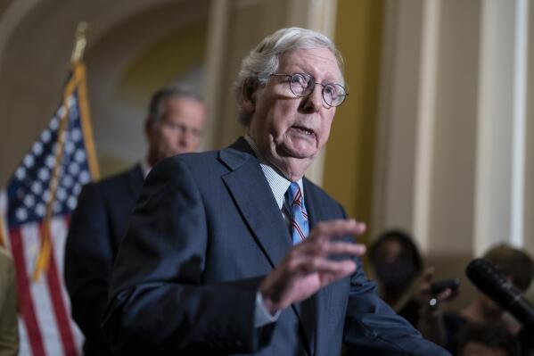 Senate Minority Leader Mitch McConnell, R-Ky., talks to reporters as the Senate works to pass a stopgap spending bill that would fund the federal government into mid-December, at the Capitol in Washington, Wednesday, Sept. 28, 2022. (AP Photo/J. Scott Applewhite)