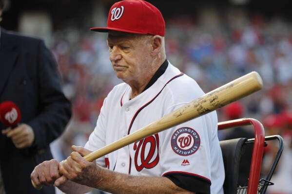 FILE - Former Washington Senators player Frank Howard grips a baseball bat during a pregame ceremony at Nationals Park, Aug. 26, 2016, in Washington. Former major leaguer Howard has died at the age of 87. A spokesperson for the Washington Nationals confirmed the team was informed of Howard's death Monday, Oct. 30, 2023, by his family. (AP Photo/Pablo Martinez Monsivais, File)