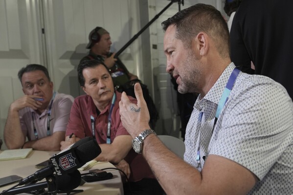 Dallas Cowboys head coach Brian Schottenheimer was interviewed at the NFL Football Annual Meeting in Palm Beach, Florida on Tuesday, April 1, 2025 (AP Photo/Lynn Sladkey)