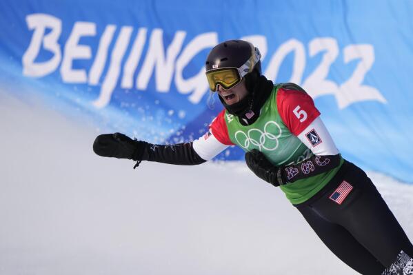 United States' Lindsey Jacobellis celebrates after winning a gold medal in the women's cross at the 2022 Winter Olympics, Wednesday, Feb. 9, 2022, in Zhangjiakou, China. (AP Photo/Lee Jin-man)