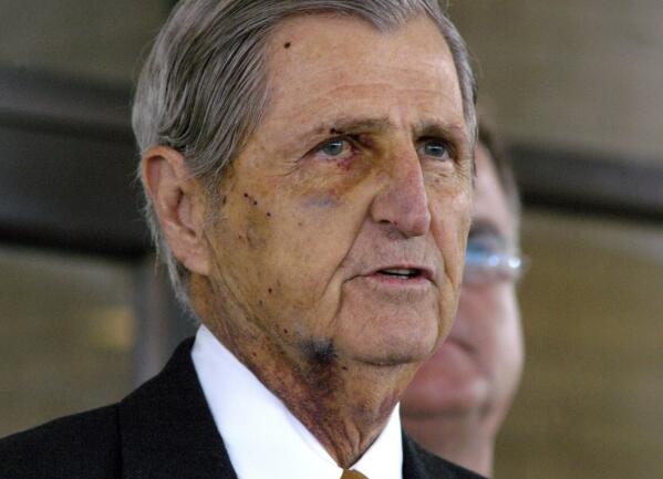 FILE - Austin, Texas, attorney Harry Whittington steps out to talk with members of the media, Feb. 17, 2006, in front of Christus Spohn Corpus Christi Hospital-Memorial. Whittington, the man who then-Vice President Dick Cheney accidentally shot while they were hunting quail on a Texas ranch 17 years earlier, died Saturday, Feb. 4, 2023, in Austin, family friend Karl Rove said Monday, Feb. 6. He was 95. (AP Photo/Paul Iverson, File)