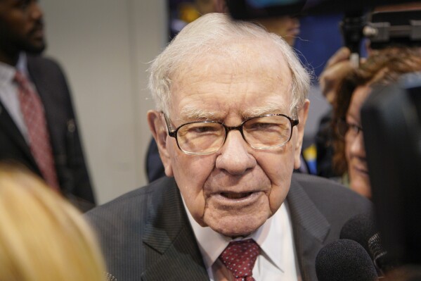 FILE - Warren Buffett, Chairman and CEO of Berkshire Hathaway, during a tour of the CHI Health convention center where various Berkshire Hathaway companies display their products, before presiding over the annual shareholders meeting in Omaha, Neb., Saturday, May 4, 2019. Buffett topped The Chronicle of Philanthropy's annual list of the biggest charitable donations in 2023, with his $541.5 million gift to the Susan Thompson Buffett Foundation. (AP Photo/Nati Harnik, File)