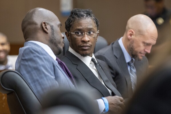 FILE - Young Thug, whose real name is Jeffery Williams, is seen at a hearing, Dec. 22, 2022, in Atlanta. On Monday, July 15, 2024, the judge who has been overseeing the long-running racketeering and gang prosecution against Young Thug and others in Atlanta was removed from the case after two defendants filed motions seeking his recusal citing a meeting the judge held with prosecutors and a state witness. (Arvin Temkar/Atlanta Journal-Constitution via AP, File)